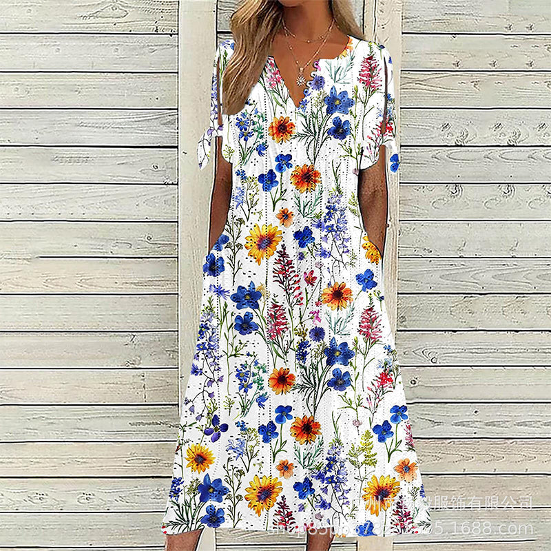 Elowena™ Luftiges Midi Sommerkleid mit Blumenmuster, V Ausschnitt und Taschen