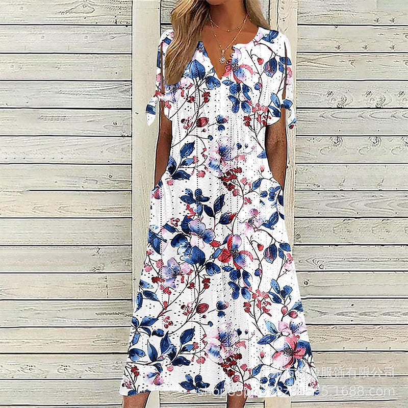 Elowena™ Luftiges Midi Sommerkleid mit Blumenmuster, V Ausschnitt und Taschen